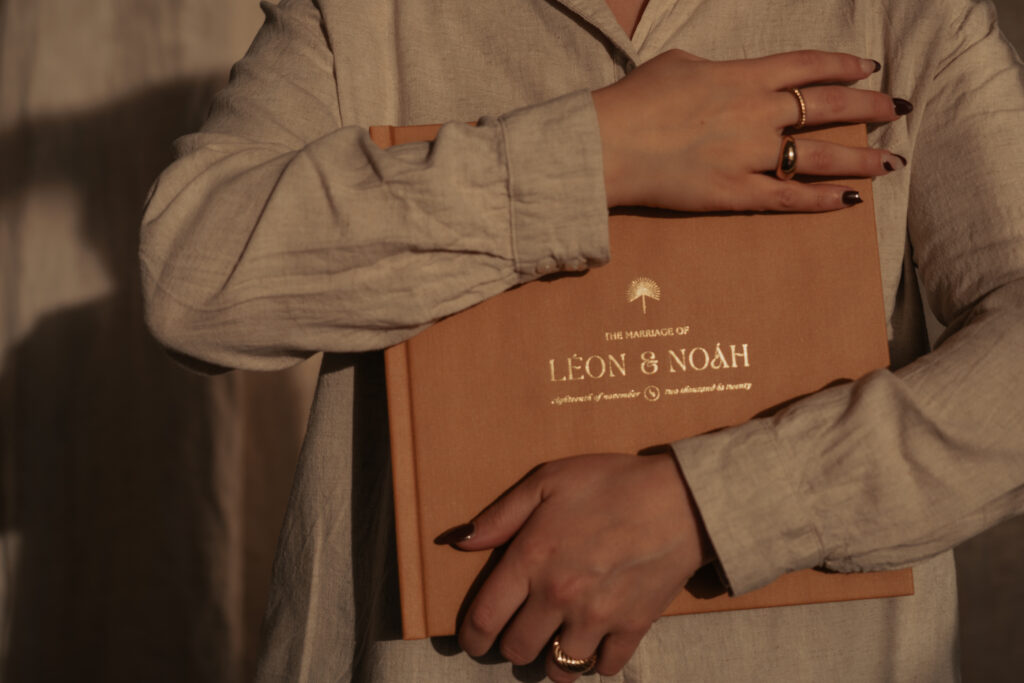 photo of bride holding her printed wedding album